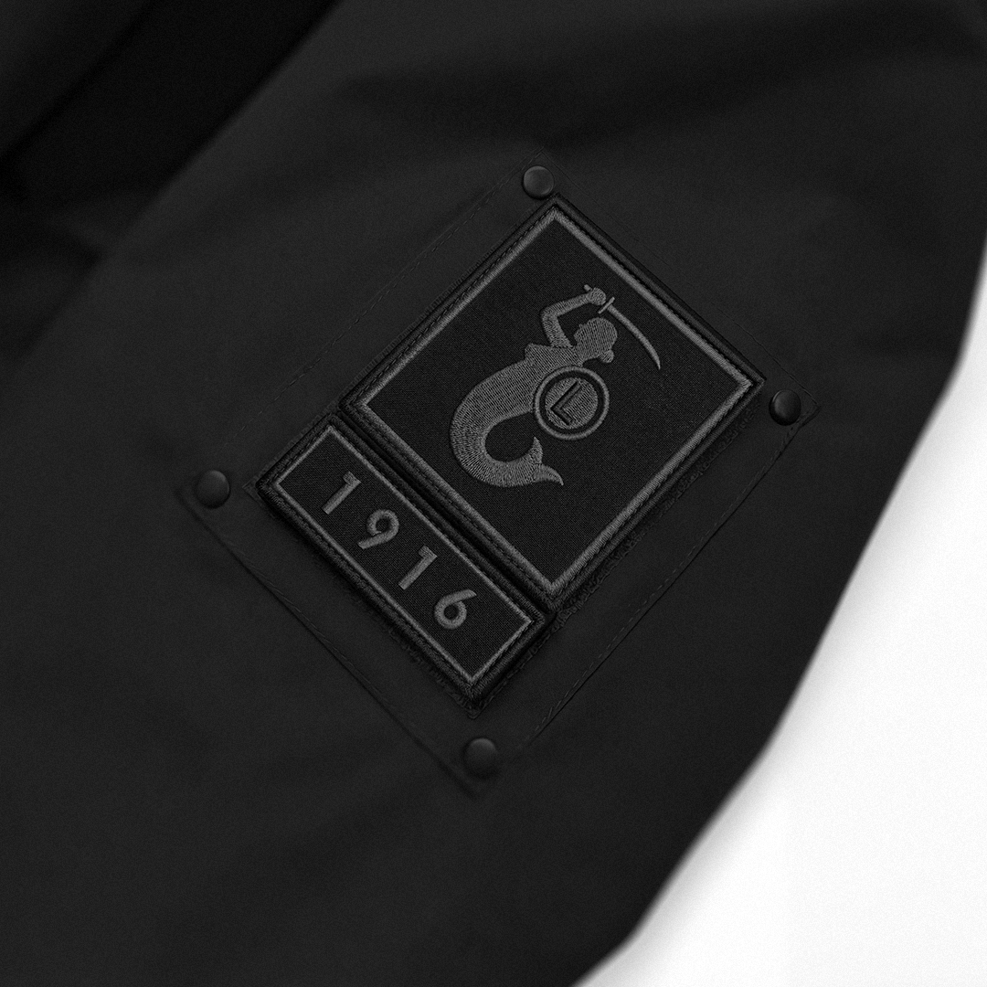 Długa czarna kurtka zimowa Syrenka 1916